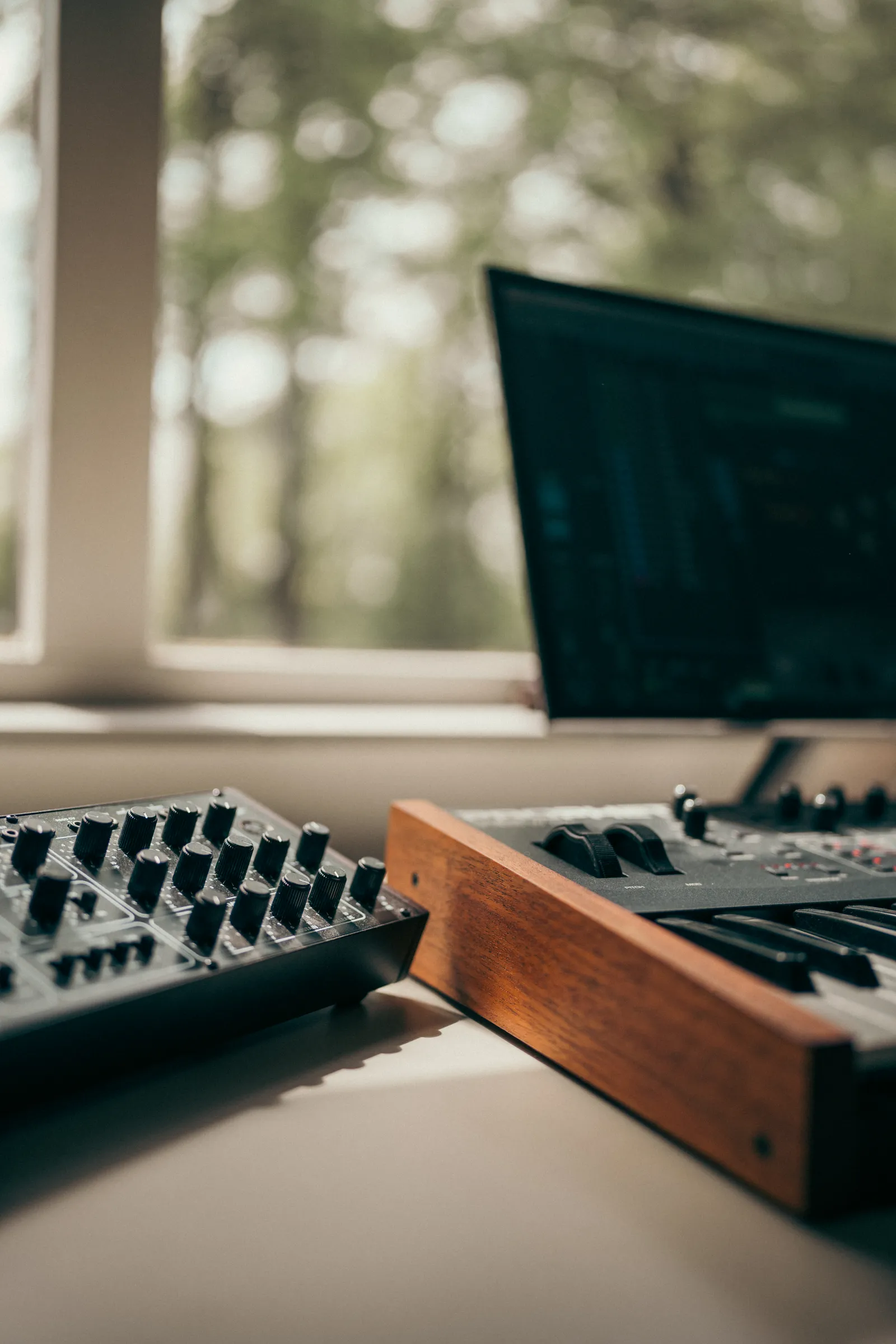 Professional studio mixing console with faders and controls